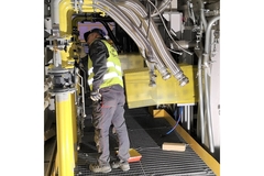 Man working on machinery.